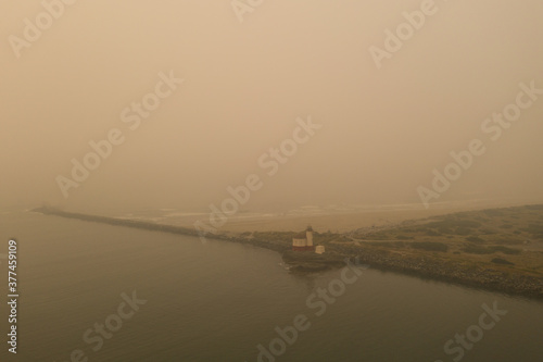 Coquille River Lighthouse in Bandon engulfed by smokey air from wildfires