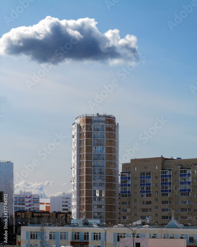 Cloud over a multi-storey building - it will rain soon