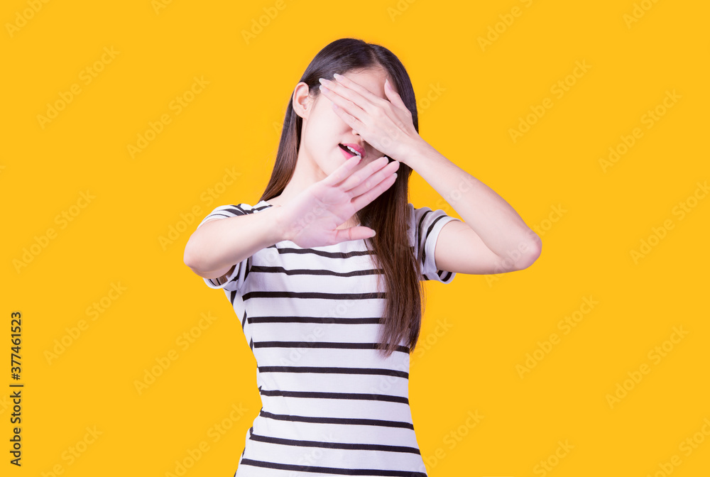 Portrait of beautiful asian young woman, on yellow color background with copy space. Human face expressions, emotions feelings, body language,beauty and fashion concept. Portrait of beautiful asian young woman, on yellow color background with copy space. Human face expressions, emotions feelings, body language,beauty and fashion concept.