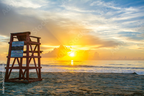 Cocoa Beach lifeguard tower on the beach at sunrise on the Space Coast in Brevard County, Florida © Ryan Tishken