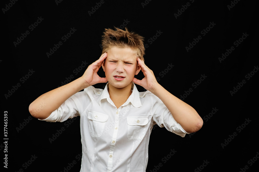 Boy in a white shirt on a background of emotions surprise joy sadness