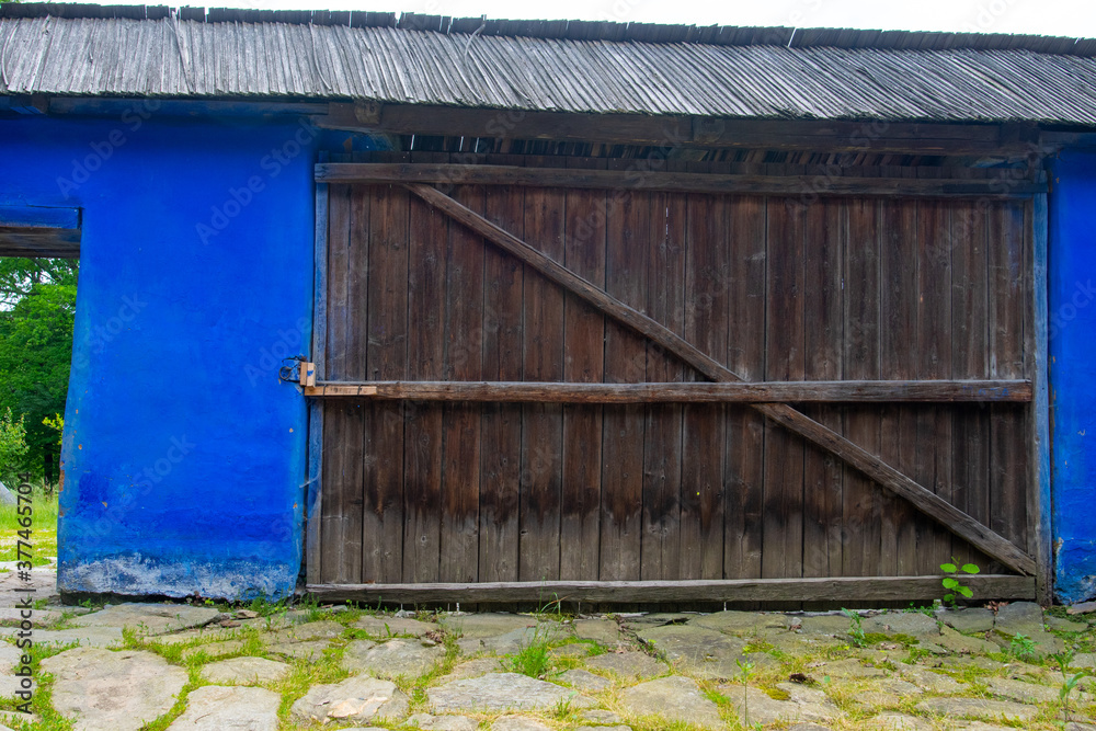 wooden door and window of the traditional wooden and brick house in the authentic village wooden door and window of the traditional wooden and brick house in the authentic village