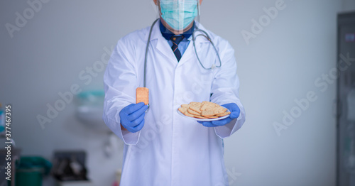 Doctors holding foods trans fats