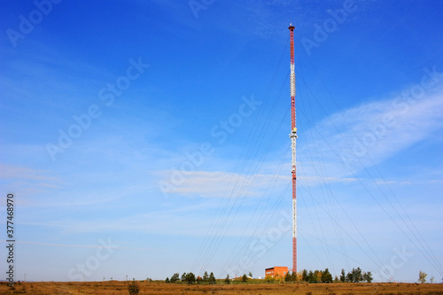 Cell tower stands in a field