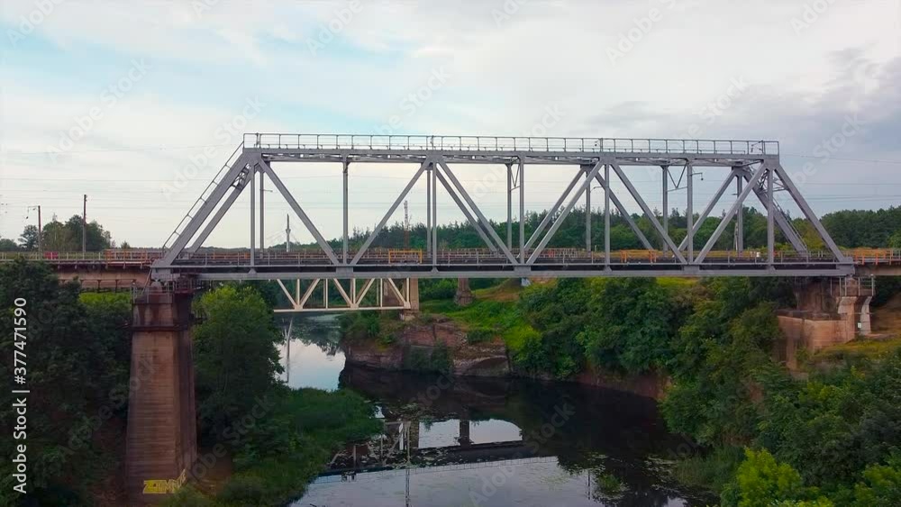 Aerial View Drone Shot Of Steel Railroad Bridge Crossing River Aerial View Drone Shot Of Steel Railroad Bridge Crossing River