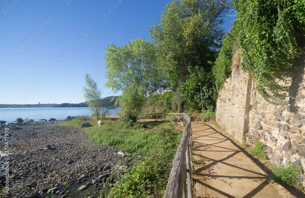 path to the bolsena lake in the capodimonte town, italy path to the bolsena lake in the capodimonte town, italy