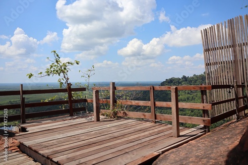 Phu Thok, Bueng Kan Province, Thailand, October 12, 2019. Landscape, wooden walkway, admiring the view on the large, rocky mountains, beautiful, northeastern tourist attraction, Thailand