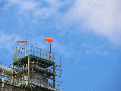 Windsock mounted on top of plant petrochemical.