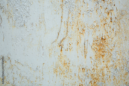 Texture of old cracked, peeling, shabby paint close-up. Background