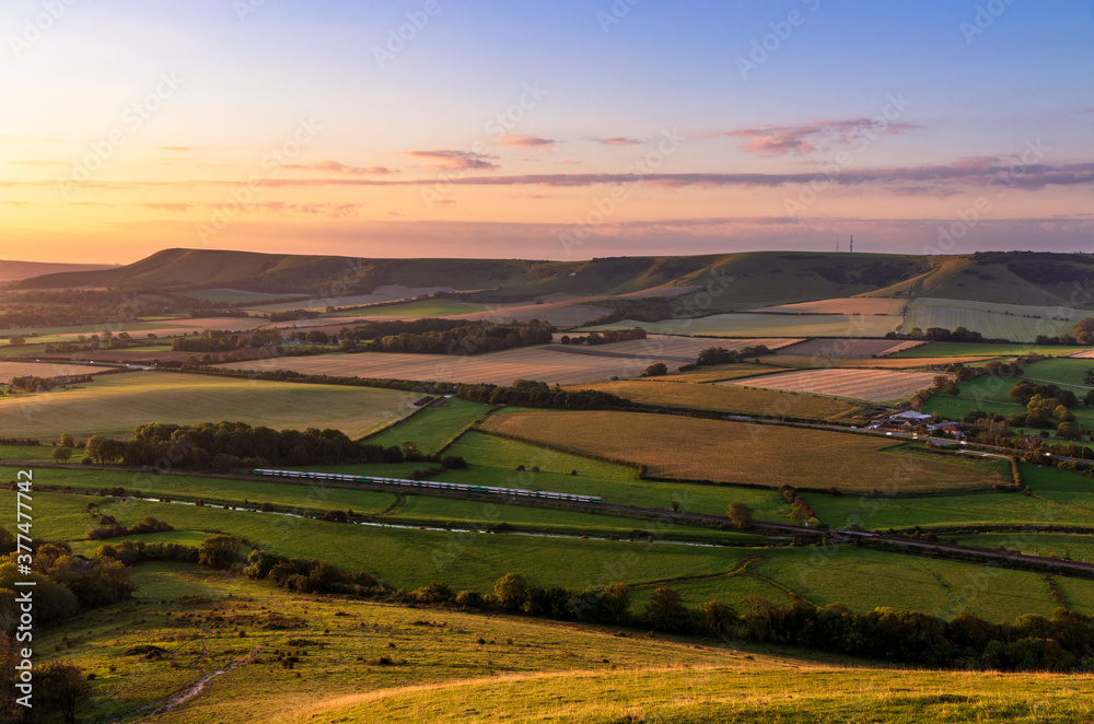 Sunrise from the top of mount Caburn on the Lewes Downs, east Sussex south east England