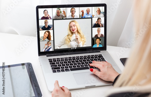 Many portraits faces of diverse young and aged people webcam view, while engaged in videoconference on-line meeting. Group video call application easy usage concept