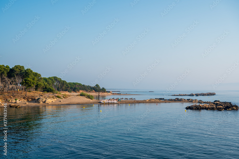 L'EScala Costa Brava Spain,  the coastline  early in the morning at Empuies, opposite the the historic  museum of Archaeology