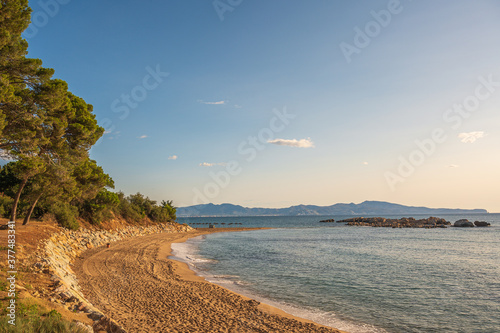 Photography L'Escala Costa Brava Spain, the coastline at Empuies, an empty beach early in th