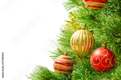 christmas decoration on fir branch isolated on white background