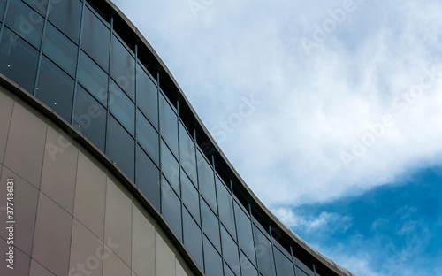 modern building with clouds sky
