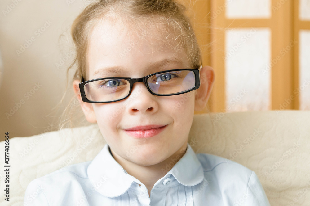 Schoolchild child smiles in glasses. Schoolchild child smiles in glasses.