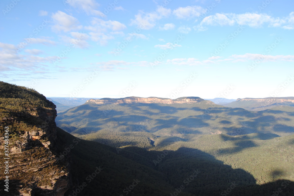 The cliffs and the hiking trails in the Blue Mountains national park in Australia on the sunny winter day