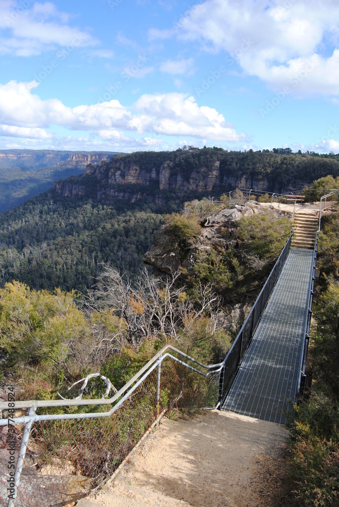 The cliffs and the hiking trails in the Blue Mountains national park in Australia on the sunny winter day