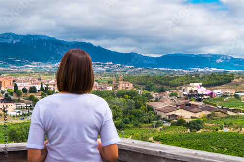 mujer en mirador
 contemplando paisaje de viñedos ne el ciego ,La Rioja alavesa

 photo