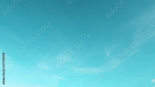 Beautiful clear cyan sky with wispy smoke clouds or cirrus & cirrostratus cloudscape changing to Angle wing on daylight horizon in tropical summer sunlight at sunny sunshine day, B-roll TimeLapse 