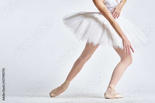 ballerina white tutu dance exercise performance light background
