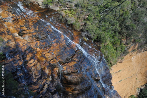 Hiking near waterfalls in Wentworth Falls in Blue Mountains national park, Australia photo