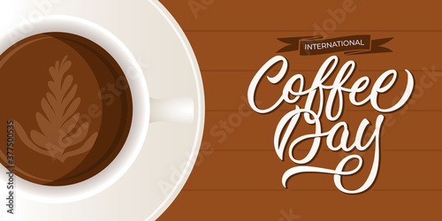 International coffee day - banner with coffee cup with modern calligraphic inscription. Vector illustration.
