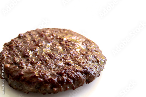 grilled burger meat on a white background