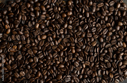 Fresh arabica coffee beans as a texture or background.