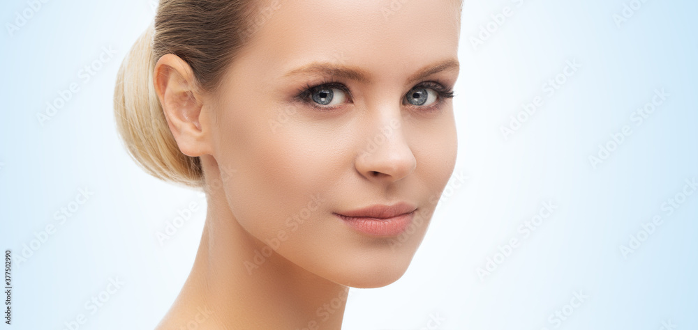 Fototapeta premium Face of a beautifyl girl. Skin lifting and cosmetics.