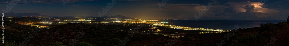 views of the north beach of peñiscola on a stormy night