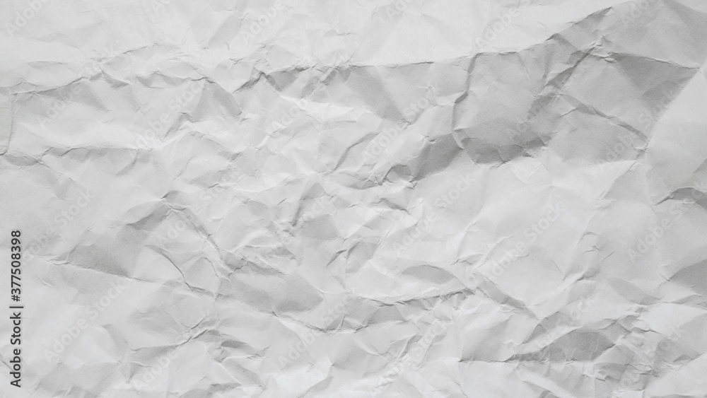 large crumpled white and grey old paper sheet background large crumpled white and grey old paper sheet background
