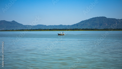 Boat in the blue water of sea