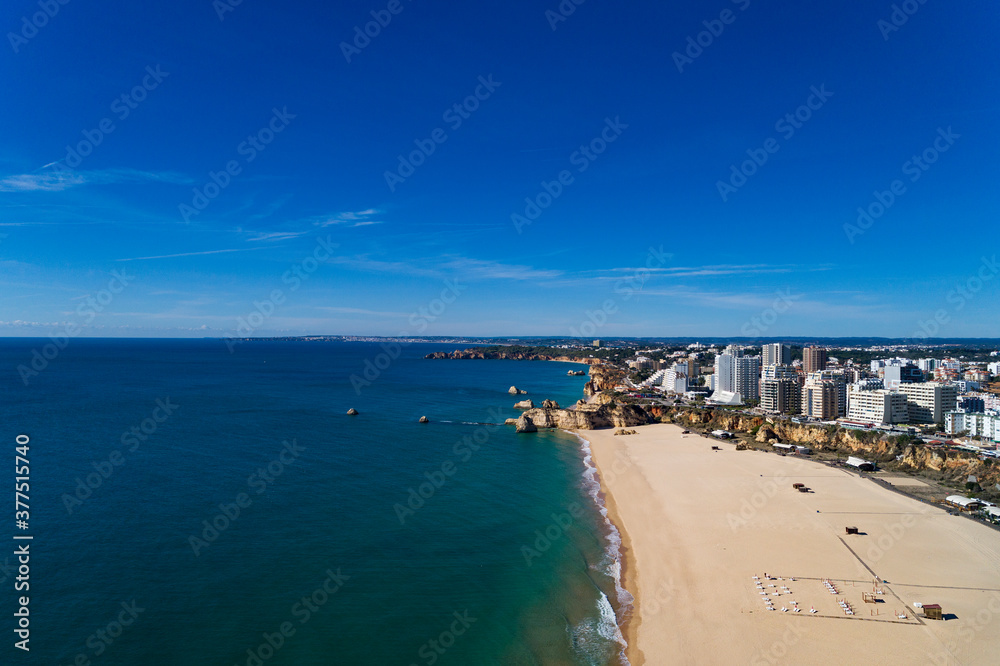 Aerial view of the beautiful Praia da Rocha (Rocha Beach) in Portimão, Algarve, Portugal