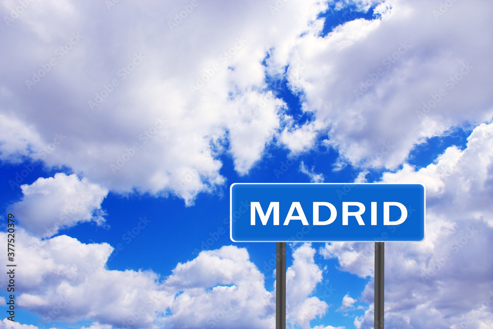 Sign with inscription Madrid with view of sky. Pointer of the settlement Sign with inscription Madrid with view of sky. Pointer of the settlement