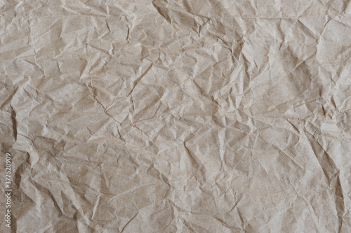 Crumpled wrapping paper as background.
