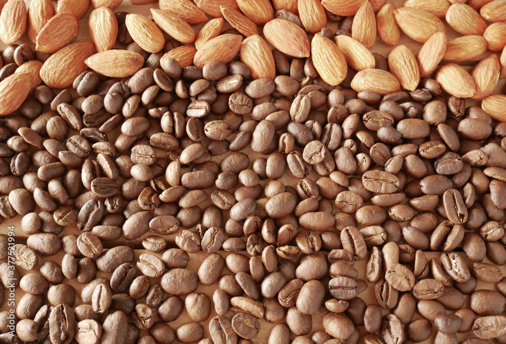mixed almond and coffee background mixed almond and coffee background