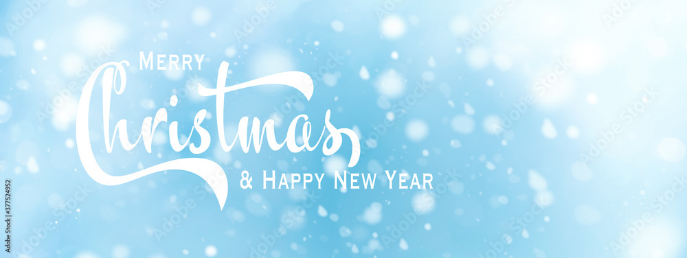 Christmas winter snow greeting card with beautiful light and snowflakes on a blue sky - banner, panorama format Christmas winter snow greeting card with beautiful light and snowflakes on a blue sky - banner, panorama format