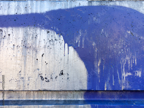 Abstract, damage to walls with many colors. Style of landscape. Rough concrete surface with cracks, scratches and paint stains. Great background or texture.