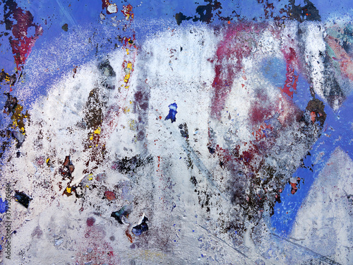 Abstract, damage to walls with many colors. Style of landscape. Rough concrete surface with cracks, scratches and paint stains. Great background or texture.