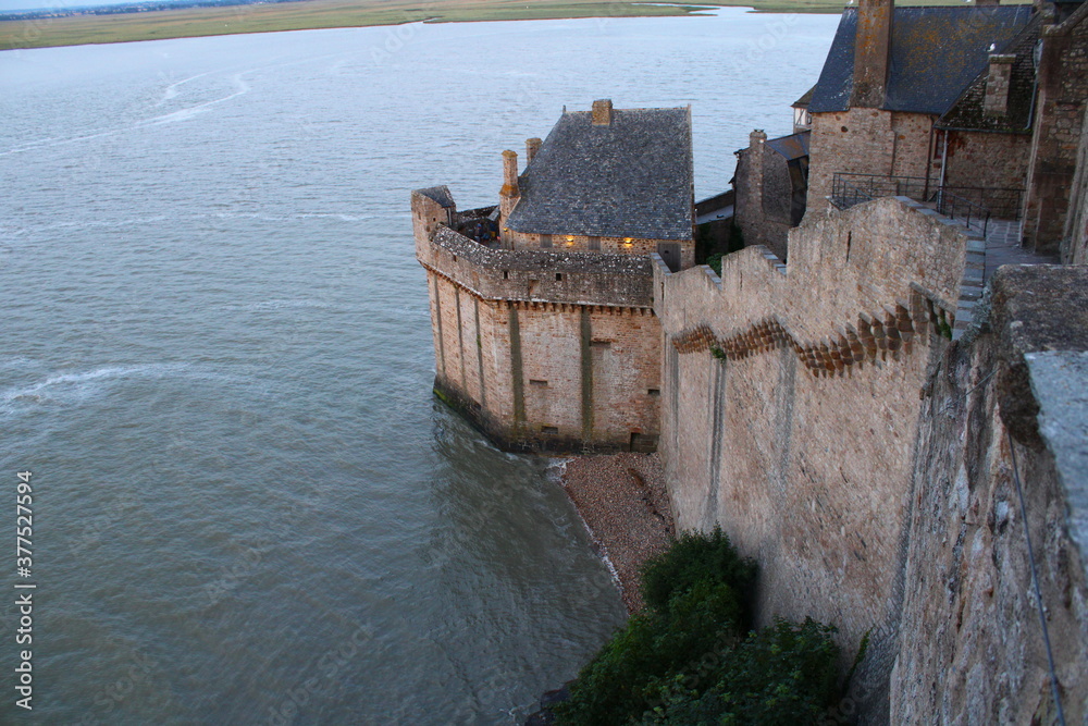 Wall from the Mont Saint-michel above the sea.