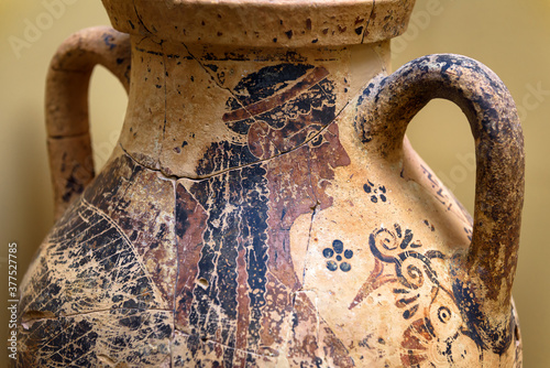 Vase from the excavations in Mycenae, Greece. Painted archeological pottery, remains of Ancient Greek culture. photo