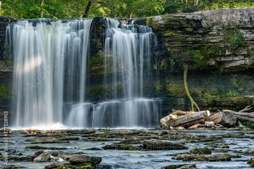 Keila waterfall in Estonia. Summer  long exposure ar daytime.