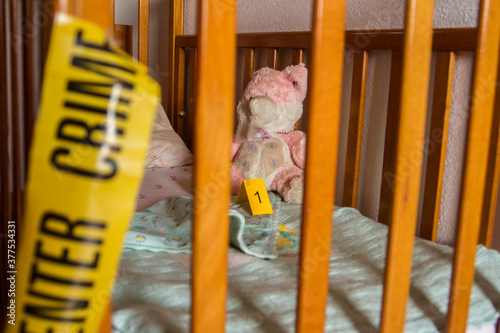 forensic investigations into the kidnapping of children from a crib with evidence in evidence marked with yellow cards from the art of investigators 
