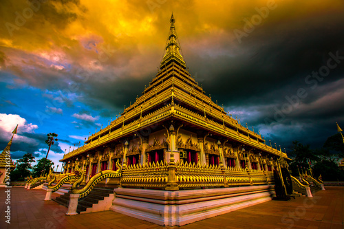 Phra Mahathat Kaen Nakhon, or Wat Nong Wang, is a royal temple with beautiful sculptures of 9-storey relics, a landmark Buddhist site in Khon Kaen Province, Thailand. © bangprik