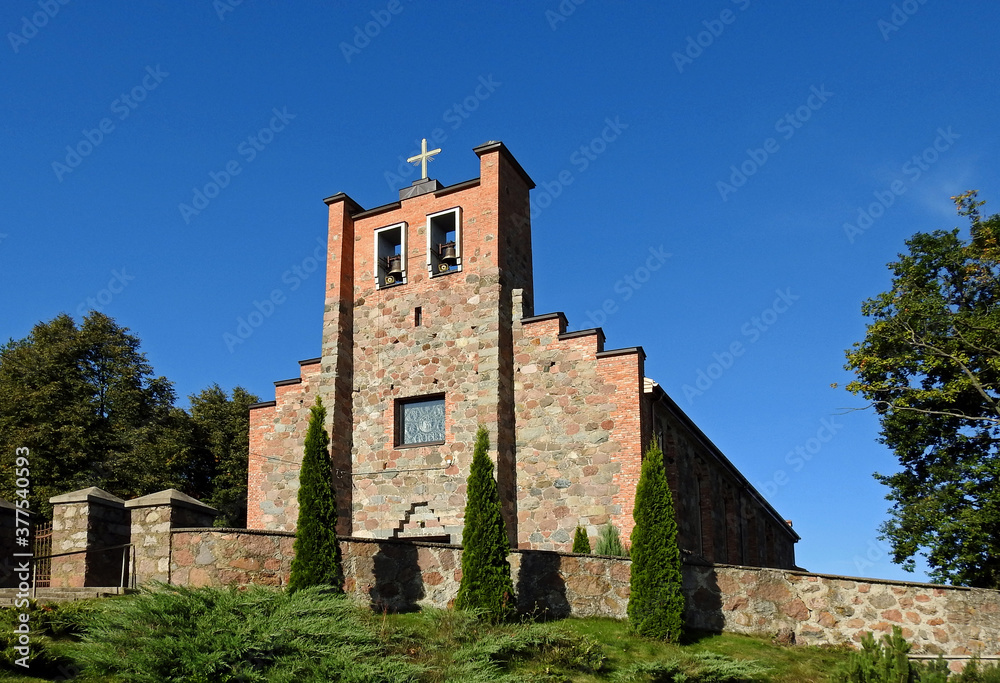 built of field stone and brick in 1960, a Roman Catholic church dedicated to the Holy Cross in the village of weightlifting in Podlasie, Poland