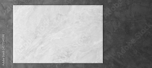 White marble texture board on light dark and gray abstract cement wall background for banner copy space. © chiew