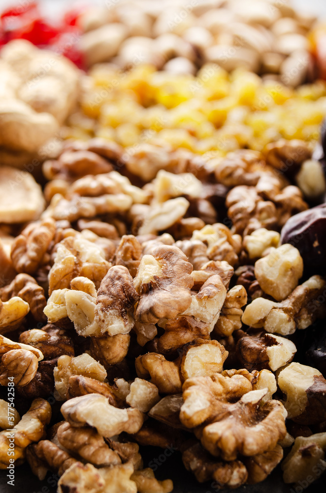 Closeup view at walnut nuts on kitchen table. Vegetarian food concept Closeup view at walnut nuts on kitchen table. Vegetarian food concept