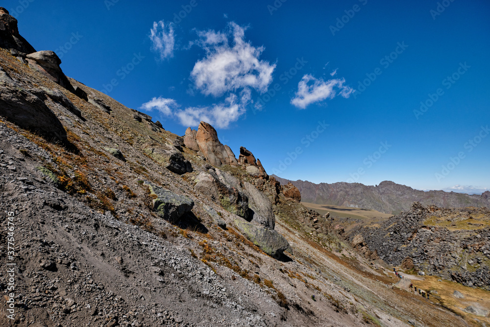 High in the mountains the grass scorched by the sun