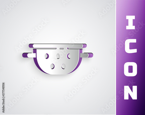 Paper cut Kitchen colander icon isolated on grey background. Cooking utensil. Cutlery sign. Paper art style. Vector.